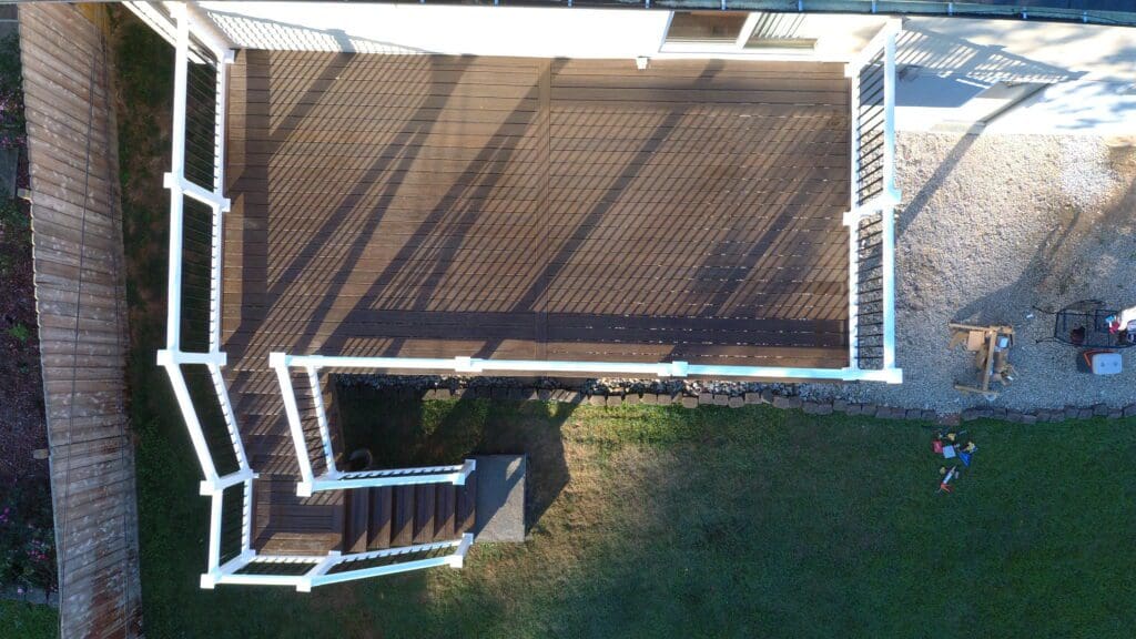 Aerial view of a wood deck with white rail