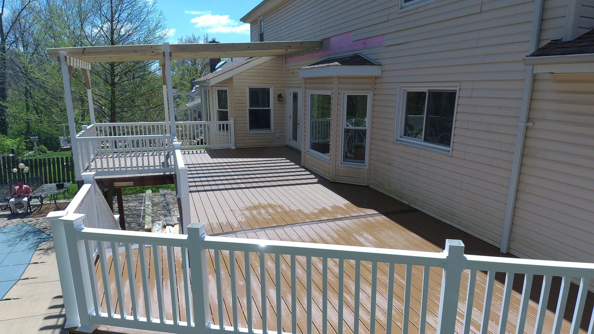 Second-story deck with pergola roof